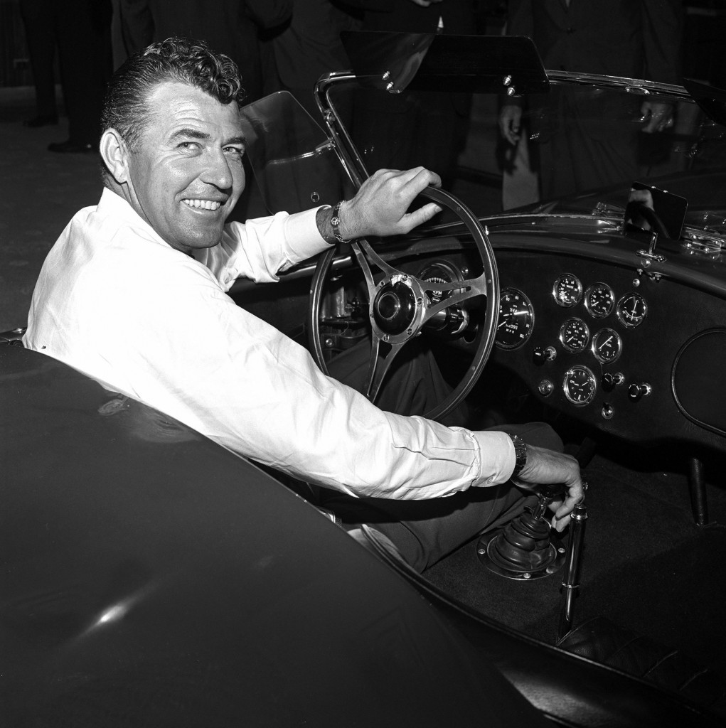 Carroll Shelby at wheel, smiling