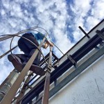 Climbing the ladder onto the rooftop over Vienna