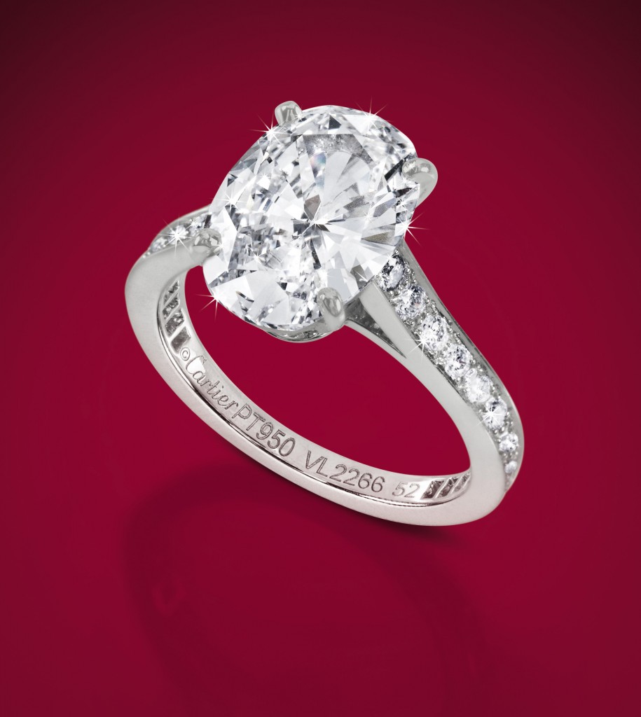A Cartier diamond ring. Brilliant oval cut weighing 3,01 carats with other brilliants weighing 0,40 carats. The price estimate is €80 000 - 150 000.