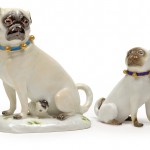 Lot 899. Female pug with puppy and small pug with light blue collars, Meißen, 2nd half of the 19th century