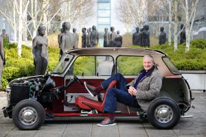 Inventor and entrepreneur Sir James Dyson at his Malmesbury offices, Wiltshire with a bisection of an original Mini - homage to his design hero Alec Issigonis. (Photo: Adrian Sherratt)