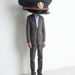 Erwin Wurm, Austrian Police Cap, 2010 Photograph: Studio Erwin Wurm Courtesy: Essl Museum, Korneuburg, Austria