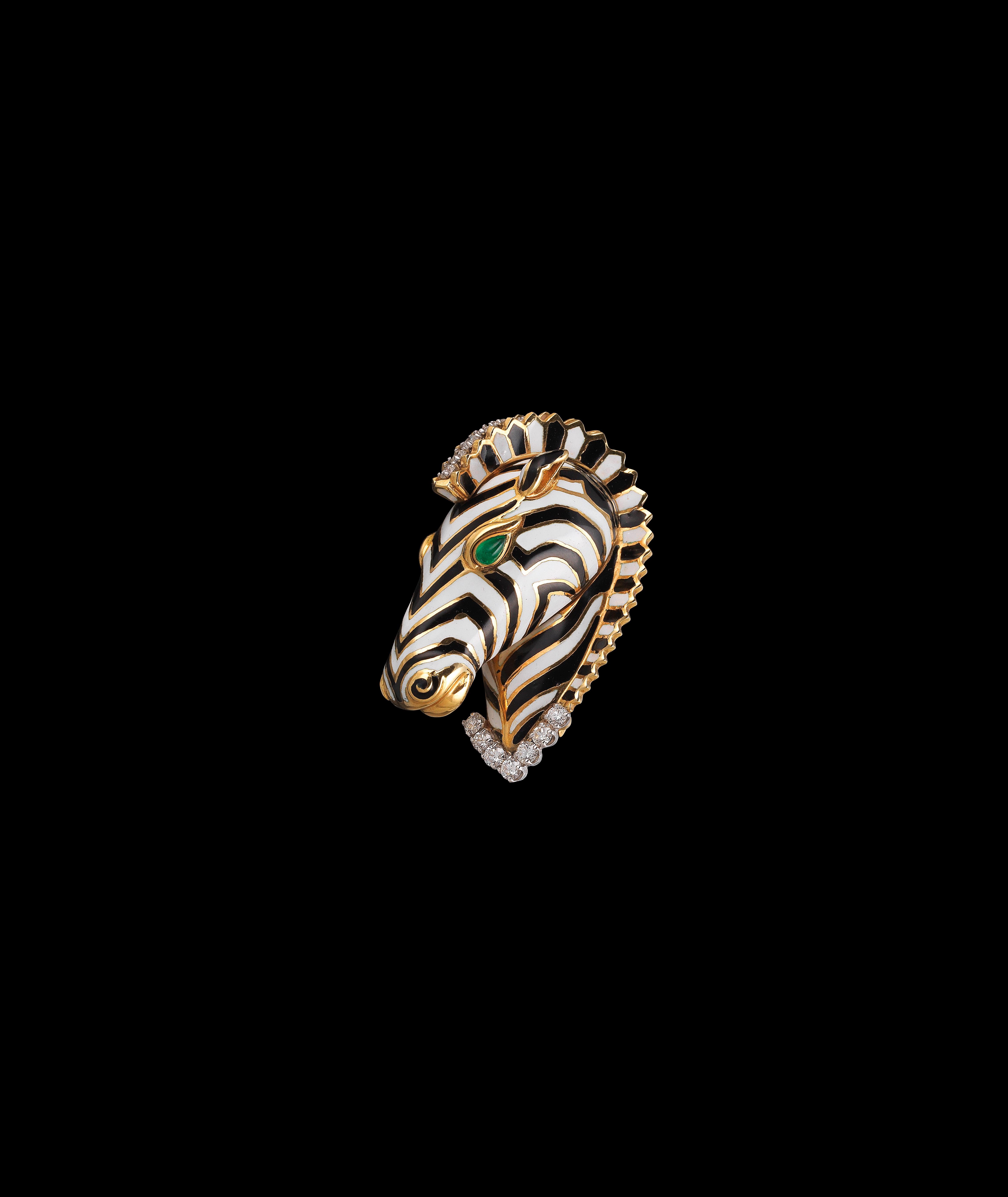 A Kingdom Zebra Brooch by David Webb, gold 750, brilliants total weight c. 1 ct, emerald cabochons, c. 1970 € 7,000 - 10,000