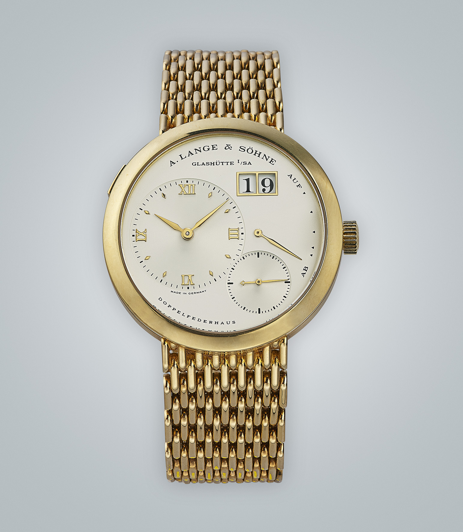 A. Lange & Söhne, Lange 1, seltene Armbanduhr mit Großdatum und Goldansatzband Referenz 151.001, um 1994, Schätzwert € 30.000 – 50.000