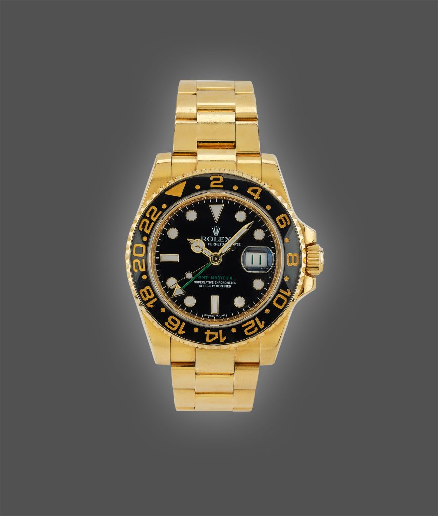 Rolex Oyster Perpetual Date GMT-Master II Armbanduhr mit zweiter Zeitzone und schwarzer Lünette, Referenz 116718, um 2010 Schätzwert € 24.000 – 36.000